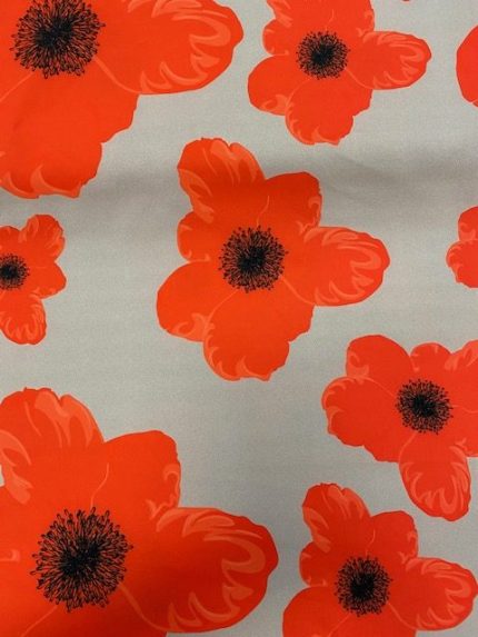 Scuba Crêpe stof, beige ondergrond, rode bloem,(de grootte van de bloem varieert van 10 tot 25 cm)