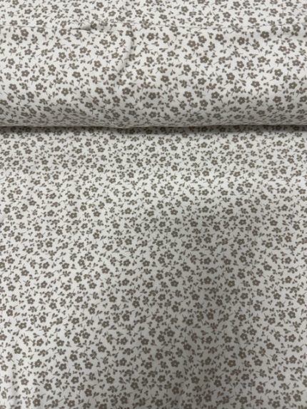 Tricot/Jersey, écru ondergrond met beige-kleurig bloem